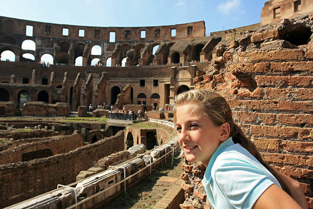 Young blond tourist in Coliseum, Rome Italy Young girl admiring Coliseum, Rome Italy inside the colosseum stock pictures, royalty-free photos & images
