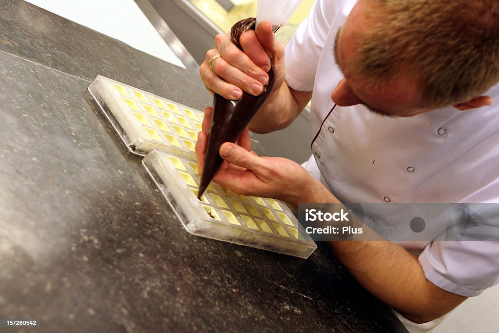 Artisanal production of Belgian chocolates at the bakery Chocolate Stock Photo
