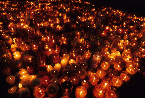 Hundreds of candles on floor of church in Mexico. 