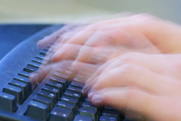 Typing Hands stock photo