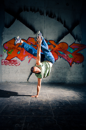 Young man breakdancing