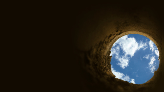 View of the sky from an underground hole