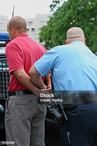 Detenção 2 - Fotografias de stock e mais imagens de Algema - Algema, Adulto, Cabeça Raspada