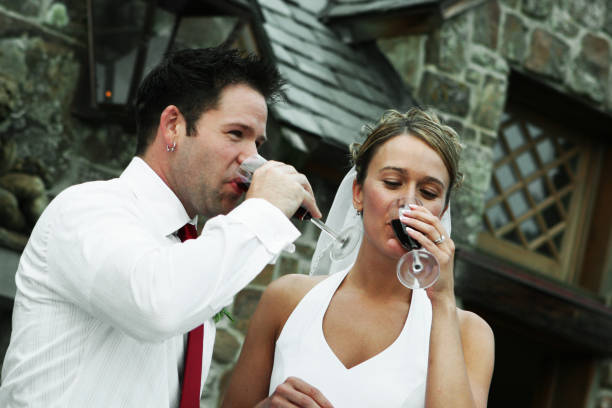 istock Newlyweds Drinking After Wedding Toast 157281754