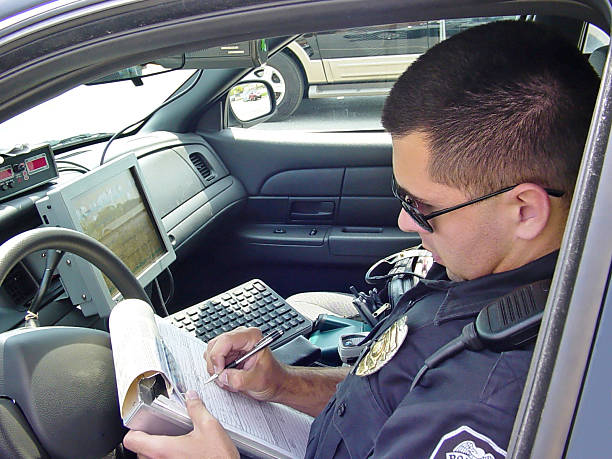Police Officer Writing Ticket 4 stock photo