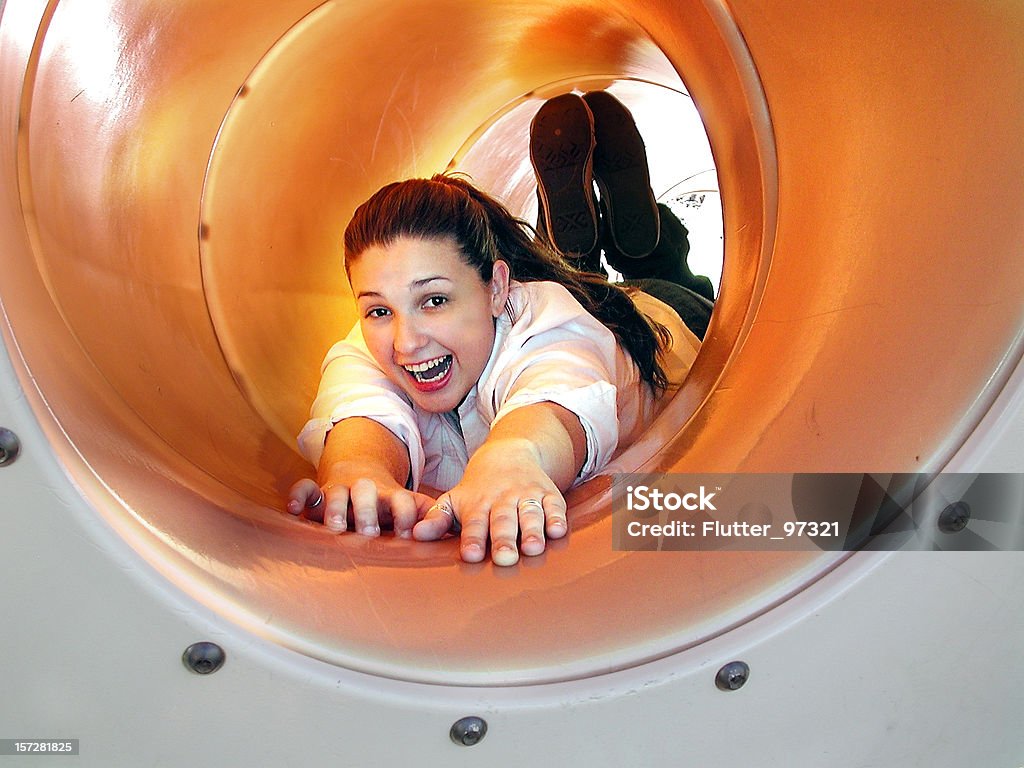 Sarah - sinking down the tube  Sliding Stock Photo