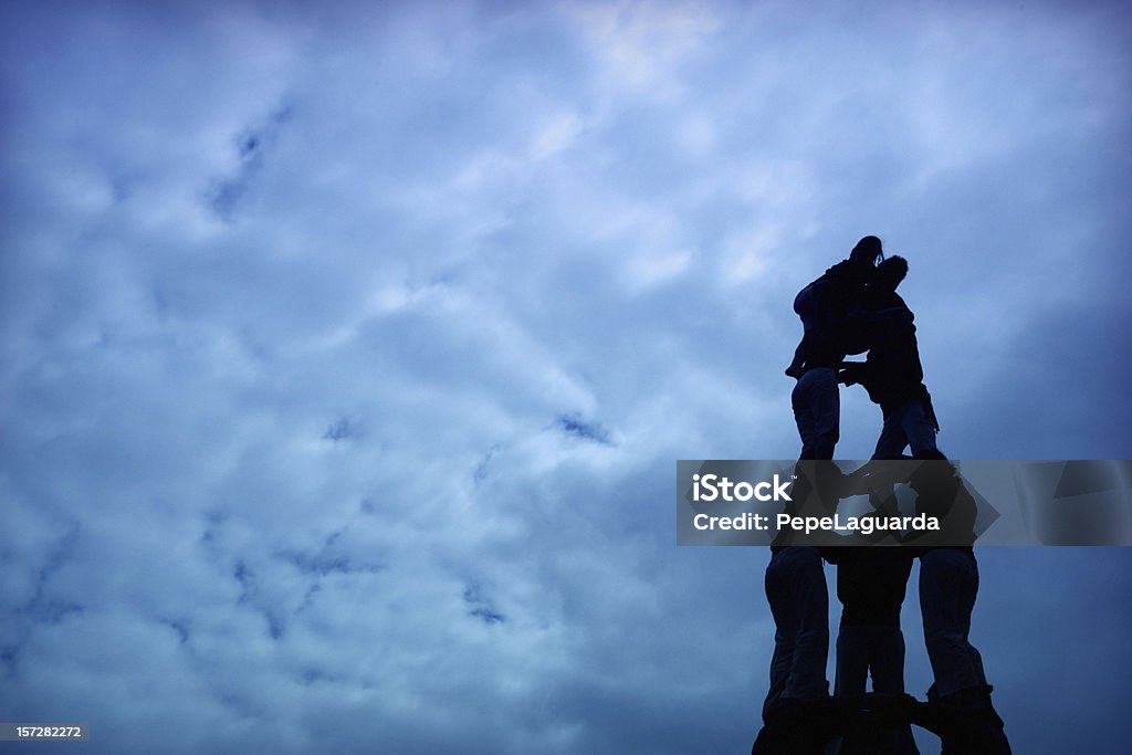 Silhouette of human castle Castellers: a group of people, that build human castles at traditional festivities. Catalonia (Spain). Castellers Stock Photo