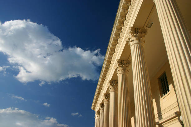 istock Clouds drifting above golden columns across a blue sky 157282755