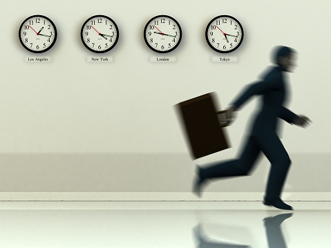 A businessman running past clocks with different timezones. 3D rendering with raytraced textures and hdri lighting.