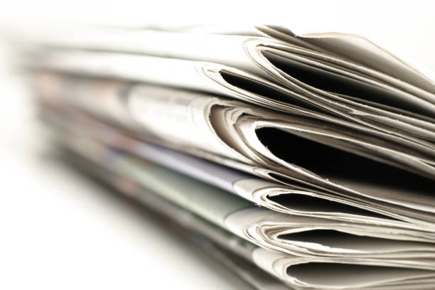 istock Pile of newspapers 157283141