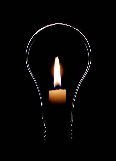Lightbulb with Flame  blackout photos stock pictures, royalty-free photos & images