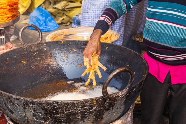 istock Frying food at a market in Srinagar. 1572835947