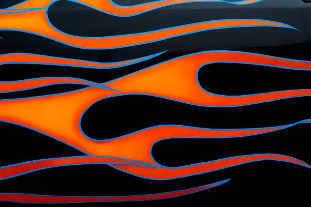 Painted flames on the side of a hotrod