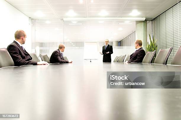 Boardroom Presentation Stock Photo - Download Image Now - High Key, Meeting, Table