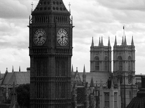 Photograph was taken on a cloudy London day from within a pod on the Lodon Eye (ferris wheel).  In the foreground is London's famous clock tower Big Ben.  Resting in the background is the famous Westminster Abbey Cathedral.  Like other b/w photographs, the original will be uploaded in the future.