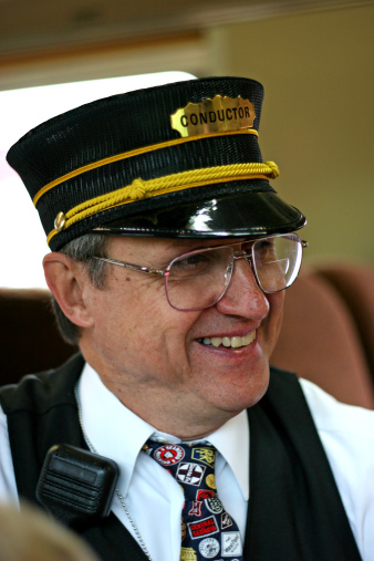 Close-up of conductor on train