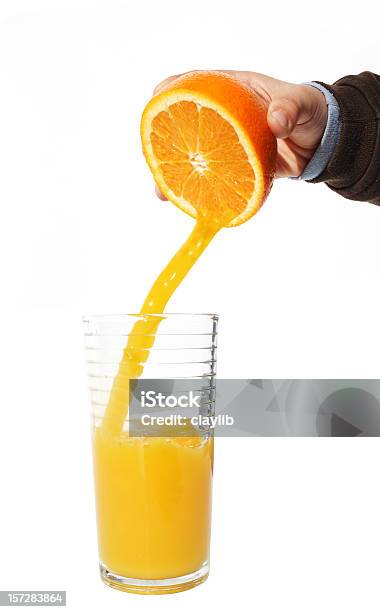 Frisch Gepressten Saftige Orange Stockfoto und mehr Bilder von Orangensaft - Orangensaft, Quetschen, Eingießen