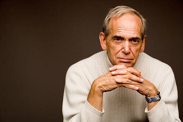 portrait of a man photo model with gray hair smiling
