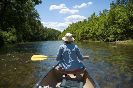 A beautiful day floating in a canoe on the Current River in the Ozark National Scenic Riverways.