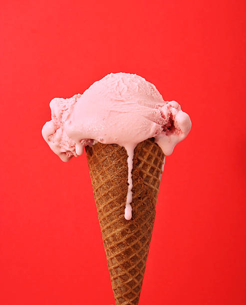 Melting Strawberry Ice Cream Cone stock photo