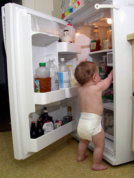 istock Baby raids the refrigerator 157284431
