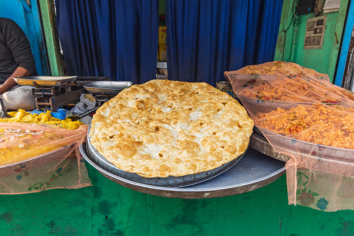Khaniyar, Srinagar, Jammu and Kashmir, India. Fried bread at a market in Srinagar.