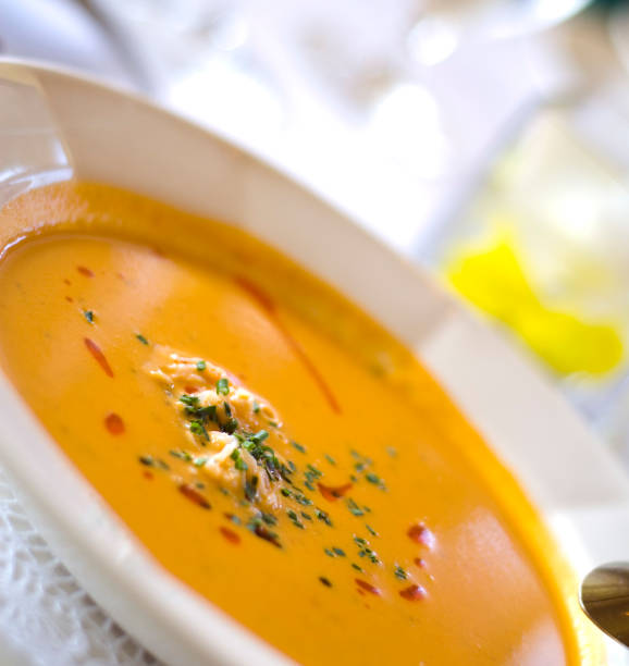 istock Crab Seafood Atop Pepper & Tomato Bisque Vegetable Soup Bowl 157284816