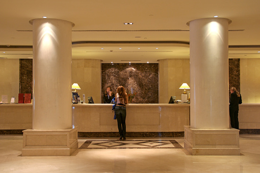 Portrait of smiling hotel receptionist