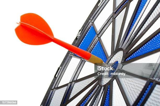 Bulls Eye Darts Isolated On White Background Stock Photo - Download Image Now - Accuracy, Dartboard, Achievement