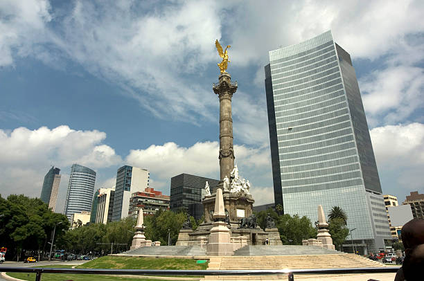 The Angel of Independence statue on Reform avenue in Mexico city at midday