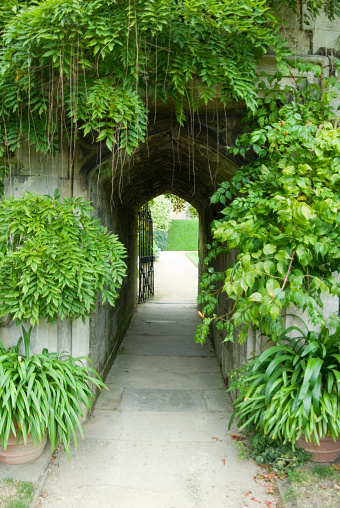 Entrance to a large open garden in a Oxfordshire manor.