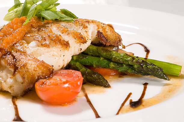 istock Fillet of white fish and vegetables 2 157286279