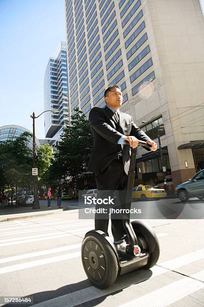 Modern Commuter Stock Photo - Download Image Now - Balance, Downtown District, Motor Scooter