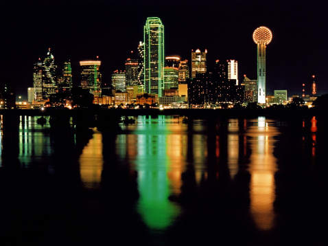 Dallas Skyline reflected in Trinity River after flood.