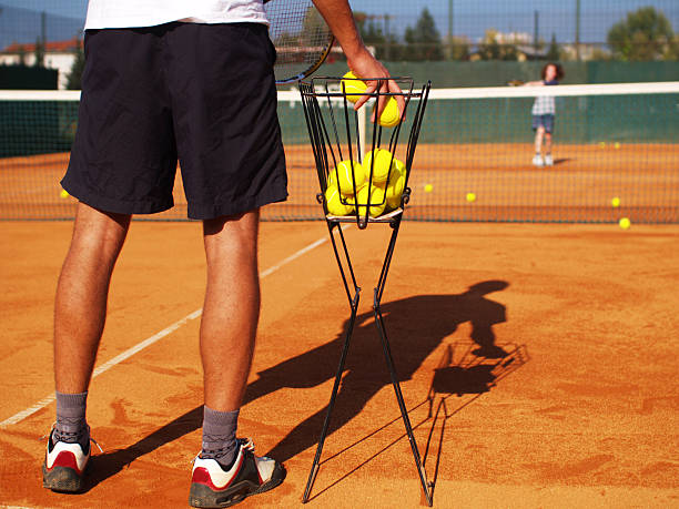 Tennis Practice Tennis training session. tennis coach stock pictures, royalty-free photos & images