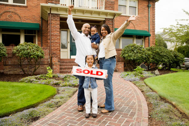 istock Family with Sold Home 157287535