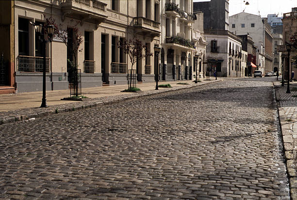 San Telmo, Buenos Aires, Argentina View of empty old street at dusk in San Telmo neighborhood, Buenos Aires, Argentina cobblestone stock pictures, royalty-free photos & images