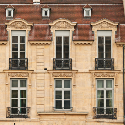 The ornate facade of a residence (Paris, France).