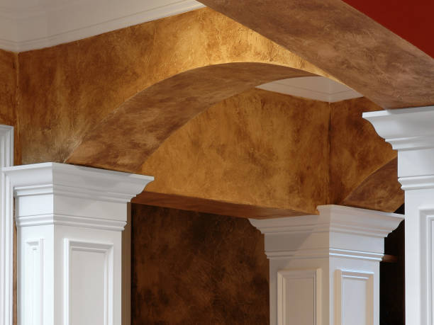 Arches Columns & Faux Finish Shown here is an intricate entry way with arches and tall columns.  The walls have a rich leathery painted faux finish. interior false ceilings stock pictures, royalty-free photos & images