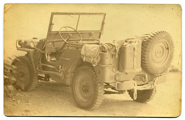 Photo of Old sepia photograph of army jeep