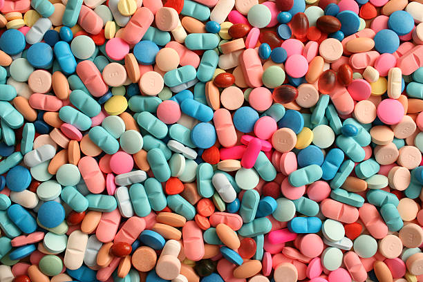 Zillion pills Top view of large amount of pills narcotic stock pictures, royalty-free photos & images