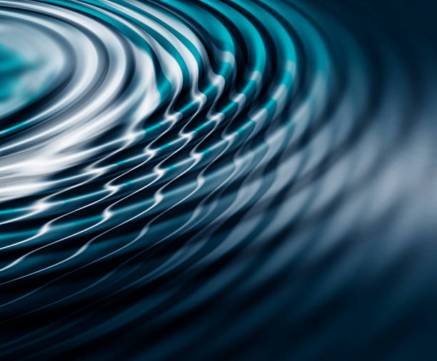 Wallpaper with Blue and white water ripples stock photo