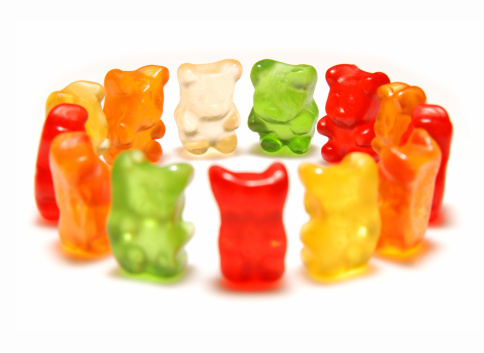 Gummy bear meeting isolated on white background.