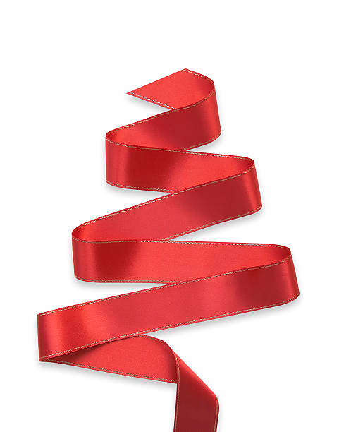 istock Red ribbon in a swirl on a white background 157288517