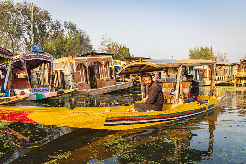 Rainawari, Srinagar, Jammu and Kashmir, India. October 24, 2022. Traditional shikara boat on Dal Lake.