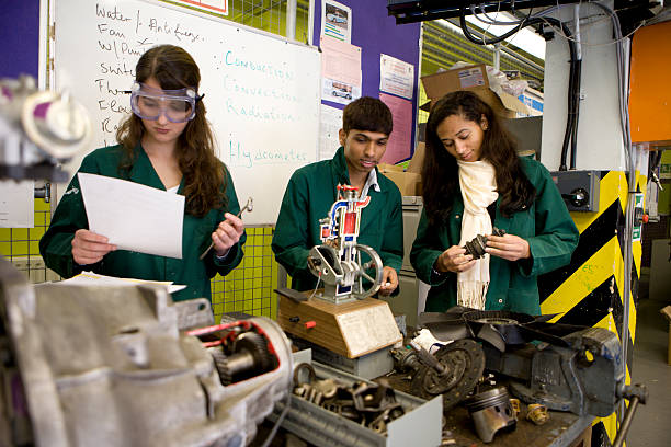 istock further education: teenage students studying mechanical engineering in the workshop 157288677