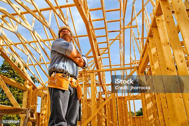 Construction Worker Pausing To Admire Handiwork Stock Photo - Download Image Now - Architect, Pride, 30-39 Years