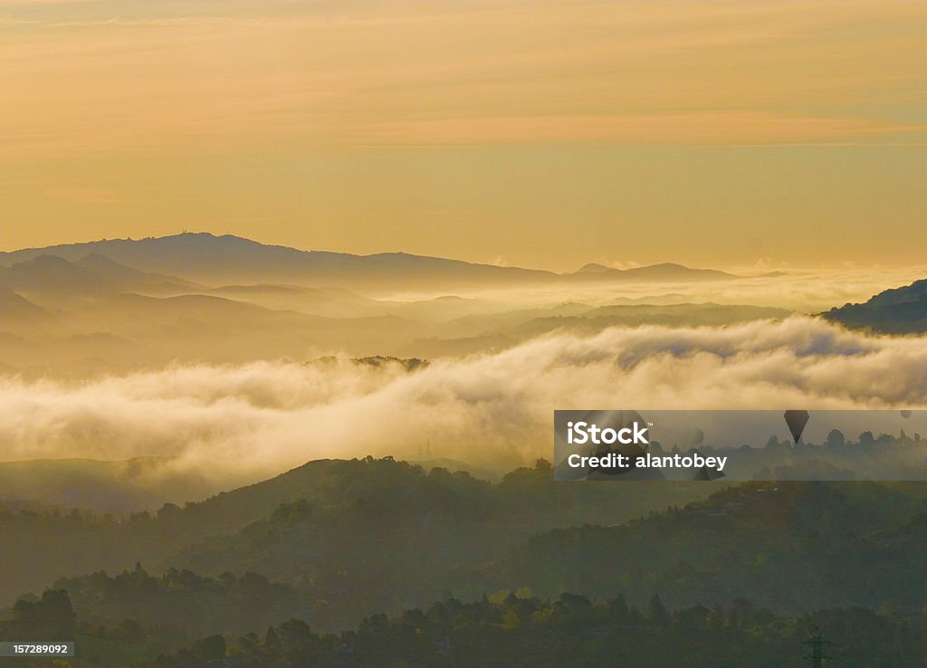 San Francisco Area: Dawn Fog over East bay Hills A dawn blanket of fog floats over the  hills south of Vollmer Peak, in Berkeley's Tilden Regional Park -- the range of hills flanking San Francisco Bay to the east.  East Bay Regional Park Stock Photo
