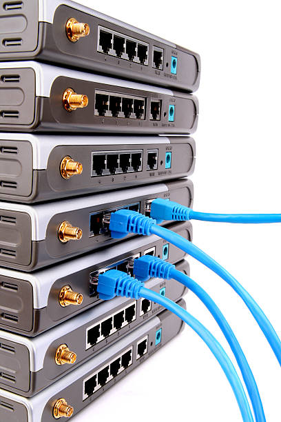 routers con cables de red. - wireless technology modem computer port cable fotografías e imágenes de stock