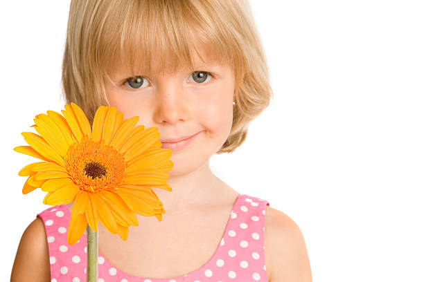 istock Little Girl Holding Flower 157289317